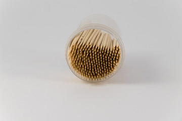 Close up brown bamboo toothpicks on white background