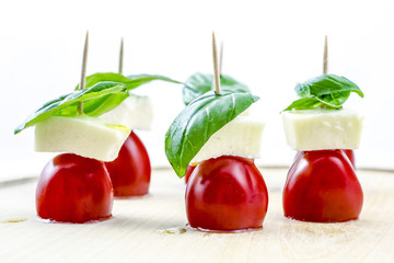 Tomato, mozzarella cheese, basil, Italian triology