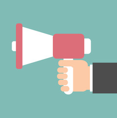 Hand holding a megaphone