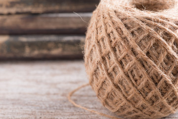Hemp rope on wood background