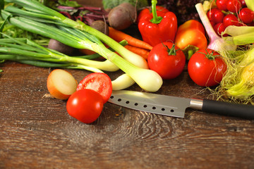 Fresh vegetables on a wooden table. Healthy food. Diet
