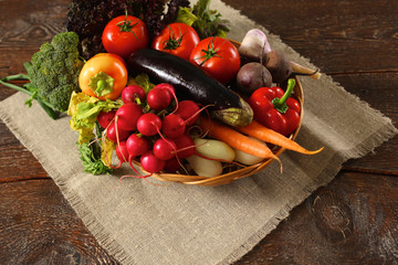 Fresh vegetables on a wooden table. Healthy food. Diet