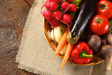 Fresh vegetables on a wooden table. Healthy food. Diet