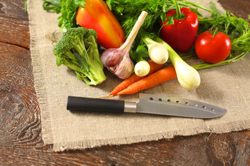 Fresh vegetables on a wooden table. Healthy food. Diet