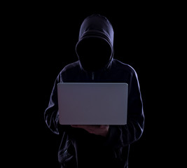 Anonymous hacker in the dark