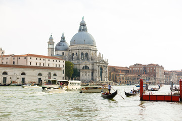 Fototapeta na wymiar Venice, Italy - July 21, 2017 : Gondola on canal in Venice, Italy