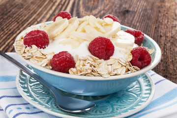 Oatmeal yogurt and fruits.