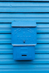 Old metallic blue letter box
