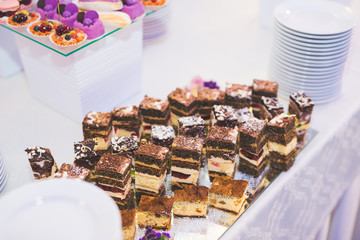 Different kinds of baked sweets on a buffet