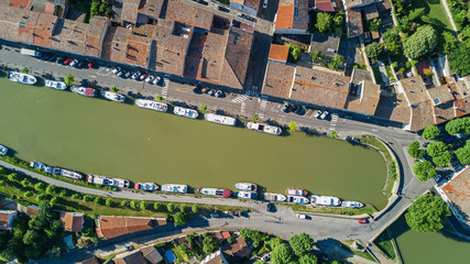 Aerial top view of boats in Canal du Midi from above, family travel by barge and vacation in Southern France
 - obrazy, fototapety, plakaty