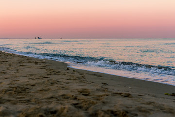 beach and sea at sunrise with beautiful colours