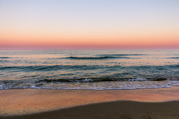 Fototapeta na wymiar minimalist sunrise over the sea