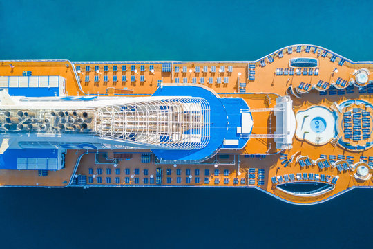 Top view of a cruise ship with sunbeds