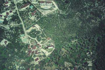 Top view of old resort town in the mountains. Toned