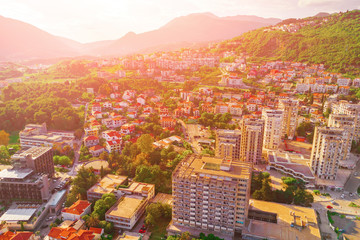 Beautiful city in the mountains in the sunshine, top view