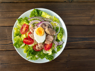 Tuna salad on the rustic table top wiew