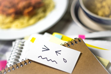 Cry Icon; Stack of Documents. Working or Studying while Eating.