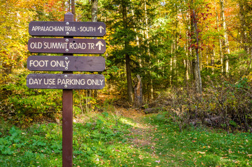Signs at the Beginning of a Mountain Path in Autumn