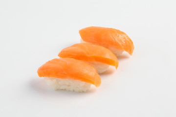 salmon sushi on white background