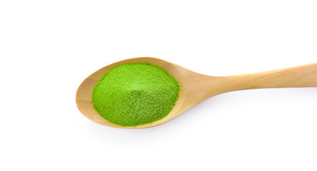 Wooden spoon with powdered matcha green tea in bowl, isolated on white