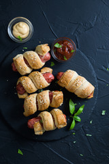 Sausages wrapped in puff pastry
