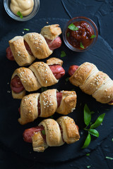Sausages wrapped in puff pastry