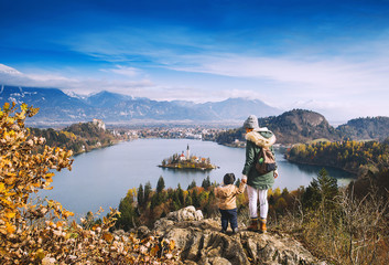 Traveling family looking on Bled Lake, Slovenia, Europe