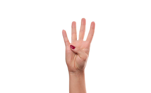 Female hands counting number four