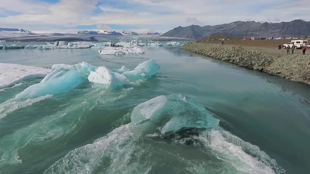 The debris of blue glaciers near the shore in the ocean. Andreev.