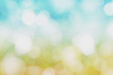 Obraz premium Blue and yellow with bokeh blurred abstract background.