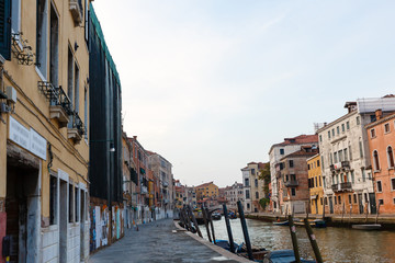 Narrow canals are famous and typical in Venice.