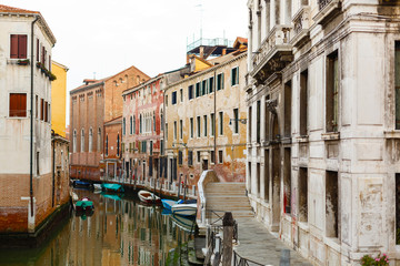 Narrow canals are famous and typical in Venice.