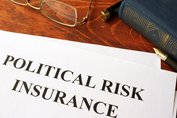 Political Risk Insurance policy on a table.