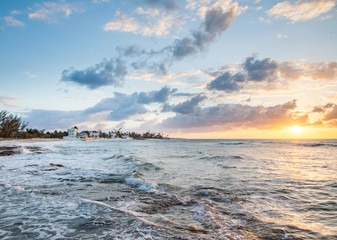 Waves cover the Shore in a Sunset scene on the Bahama Island