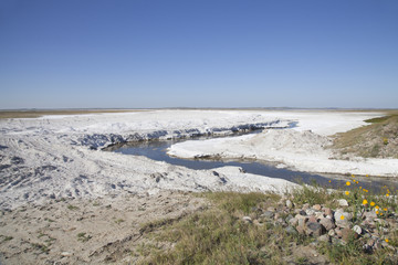 Fields of natural salt deposits in the prairies of Chaplin, Saskatchewan, Canada.