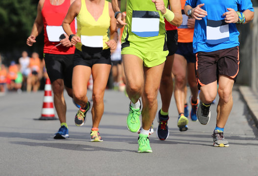 woman and many men running