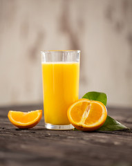 Fresh orange drink on wooden table. Fruit orangeade. Summer drink. orange orangeade.