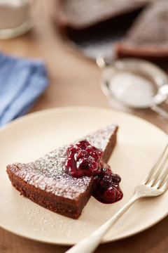 Chocolate cake with berries jam