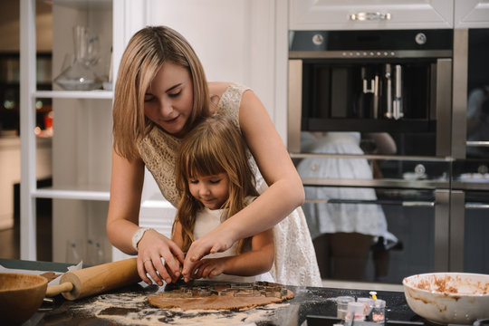 Mother and Daughter Baking Cookies