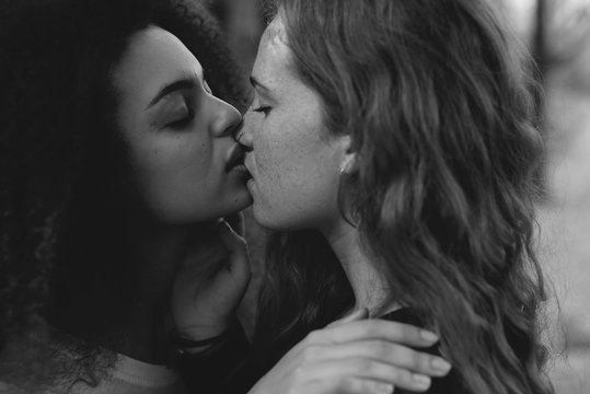 Close-up of two lesbians kissing