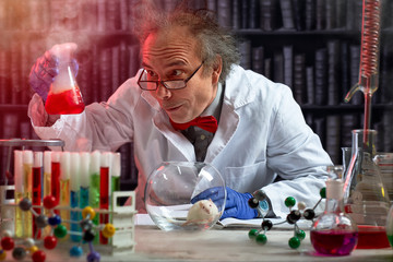 crazy scientist the making mix of chemicals - obrazy, fototapety, plakaty