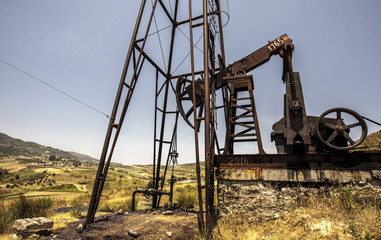 Fototapeta na wymiar Working crude oil pump in Albania countryside