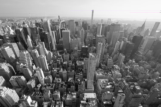 Fototapeta New York City Manhattan skyline, black and white aerial view with skyscrapers, wide angle