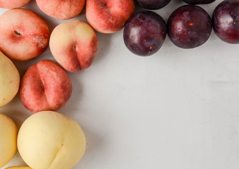 Beautiful sweet peaches and plums.