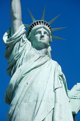 Statue of Liberty detail in a sunny day, blue sky in New York