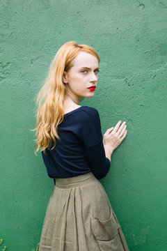 Close-up of red-haired young woman