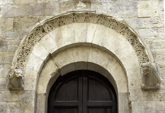 Close-up romanesque architecture cathedral portal church. Bisceglie. Apulia. Italy