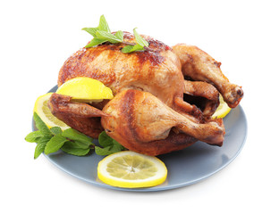 Plate with tasty homemade lemon chicken on white background