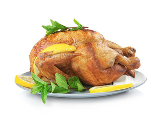 Plate with tasty homemade lemon chicken on white background