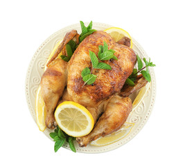 Plate with tasty homemade lemon chicken on white background